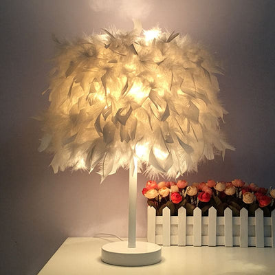 PlumeGlow – Elegant Feathered Globe Lamp