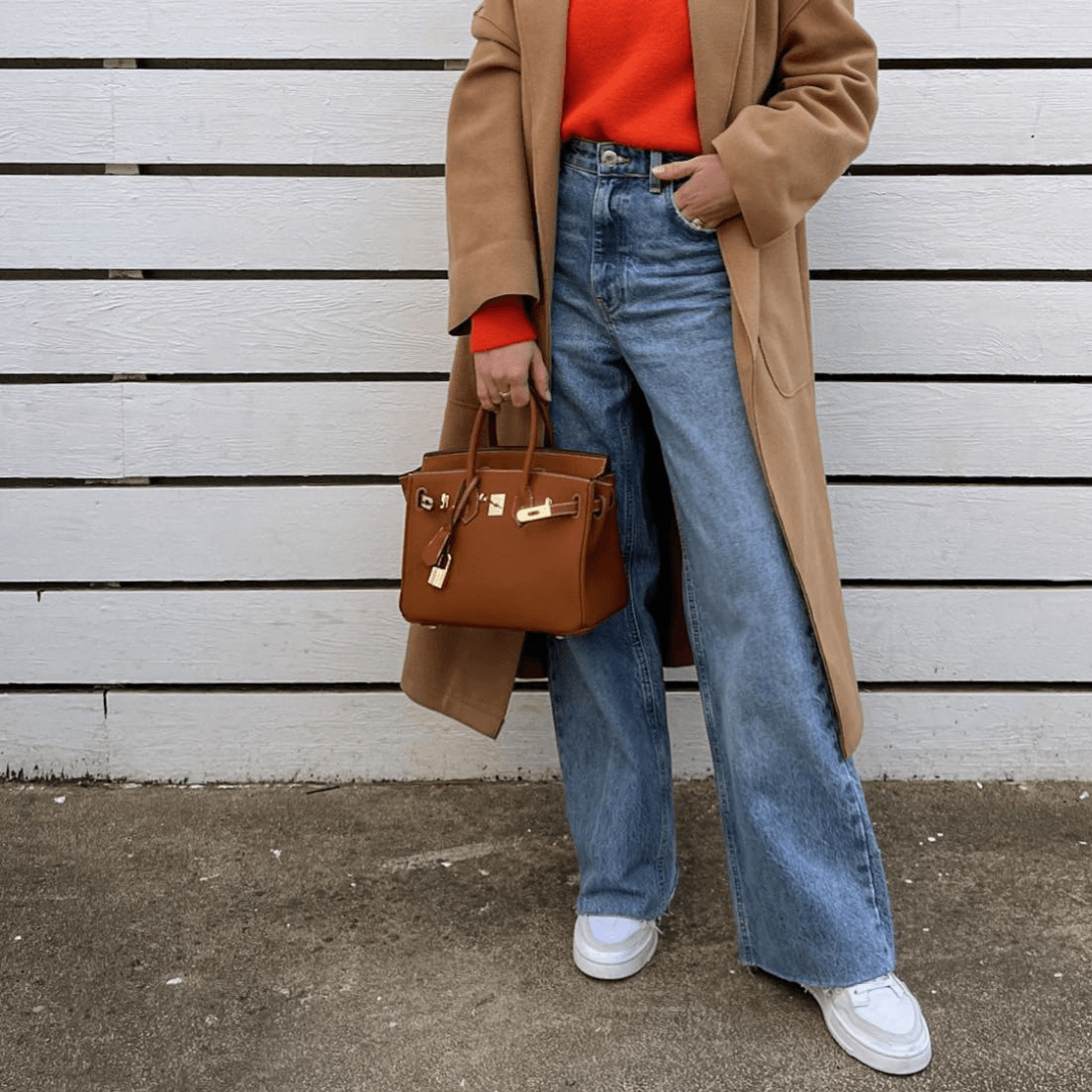 Brana – Elegant Handbag with Intricate Stitching and Unique Lock Closure
