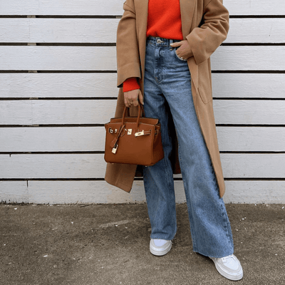 Brana – Elegant Handbag with Intricate Stitching and Unique Lock Closure