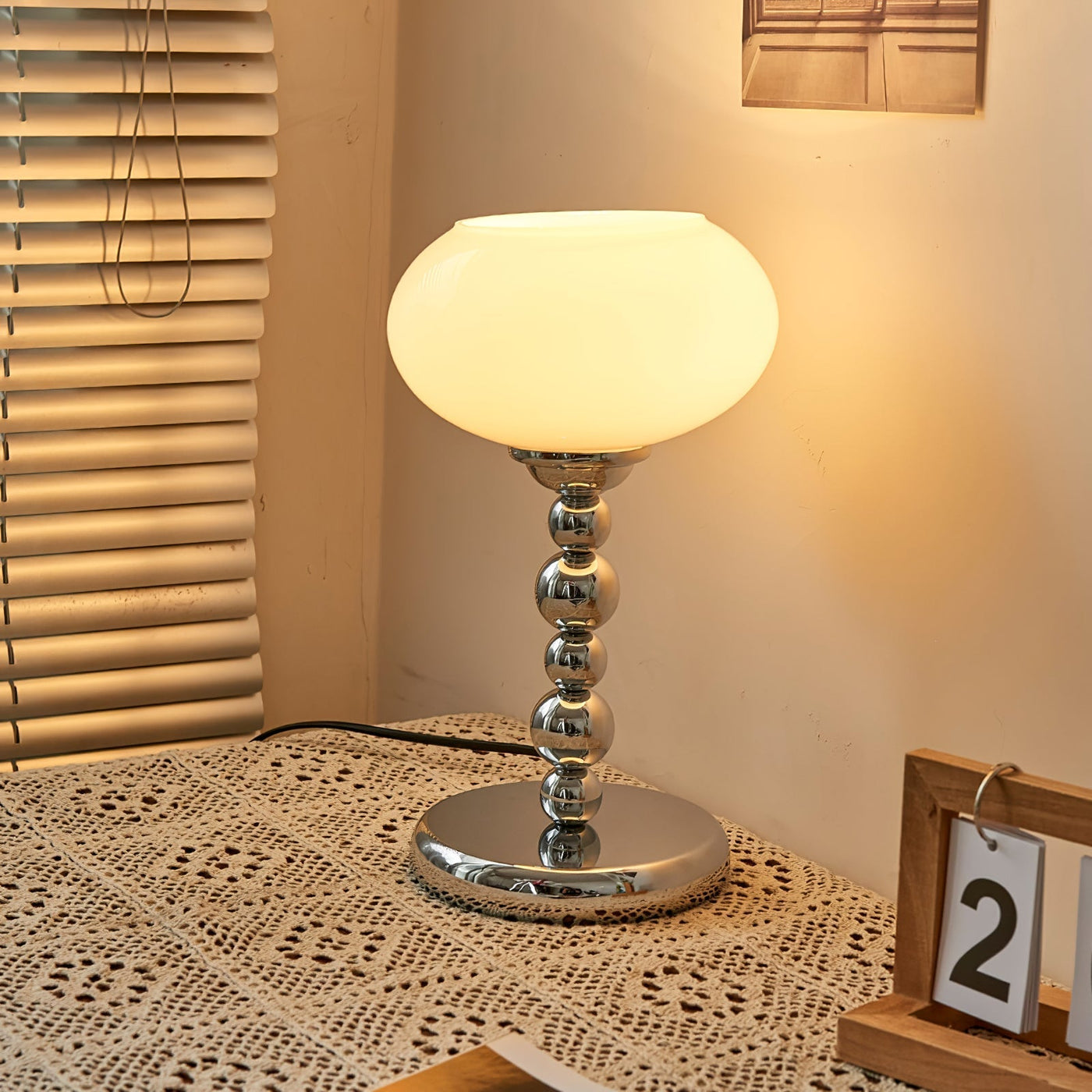 OrbitLume – Stylish Space-Age Glass and Chrome Table Lamp