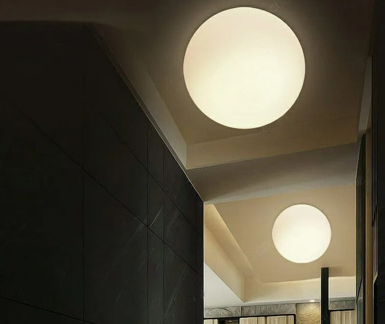 GlaciaLuxe – Minimalist Wall Lamp with Glass Stone Design